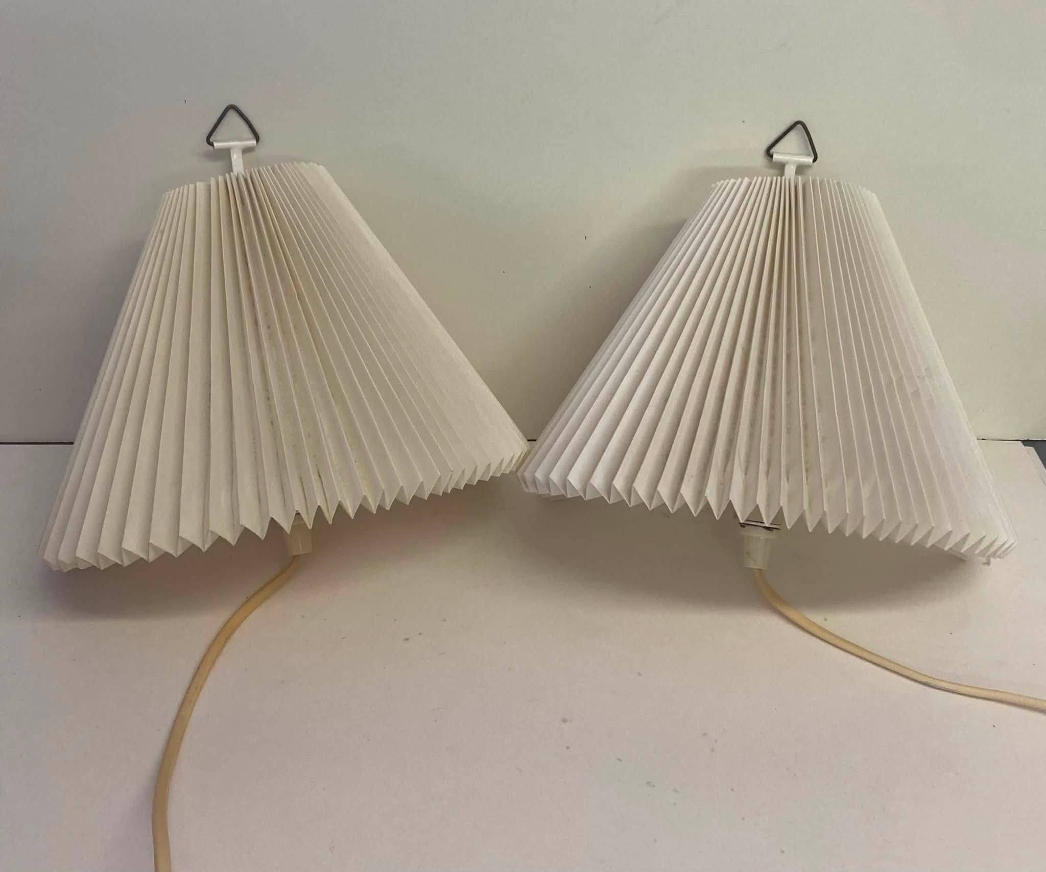 A pair Le Klint 203 væglamper