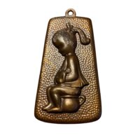 Toiletskilt med pige